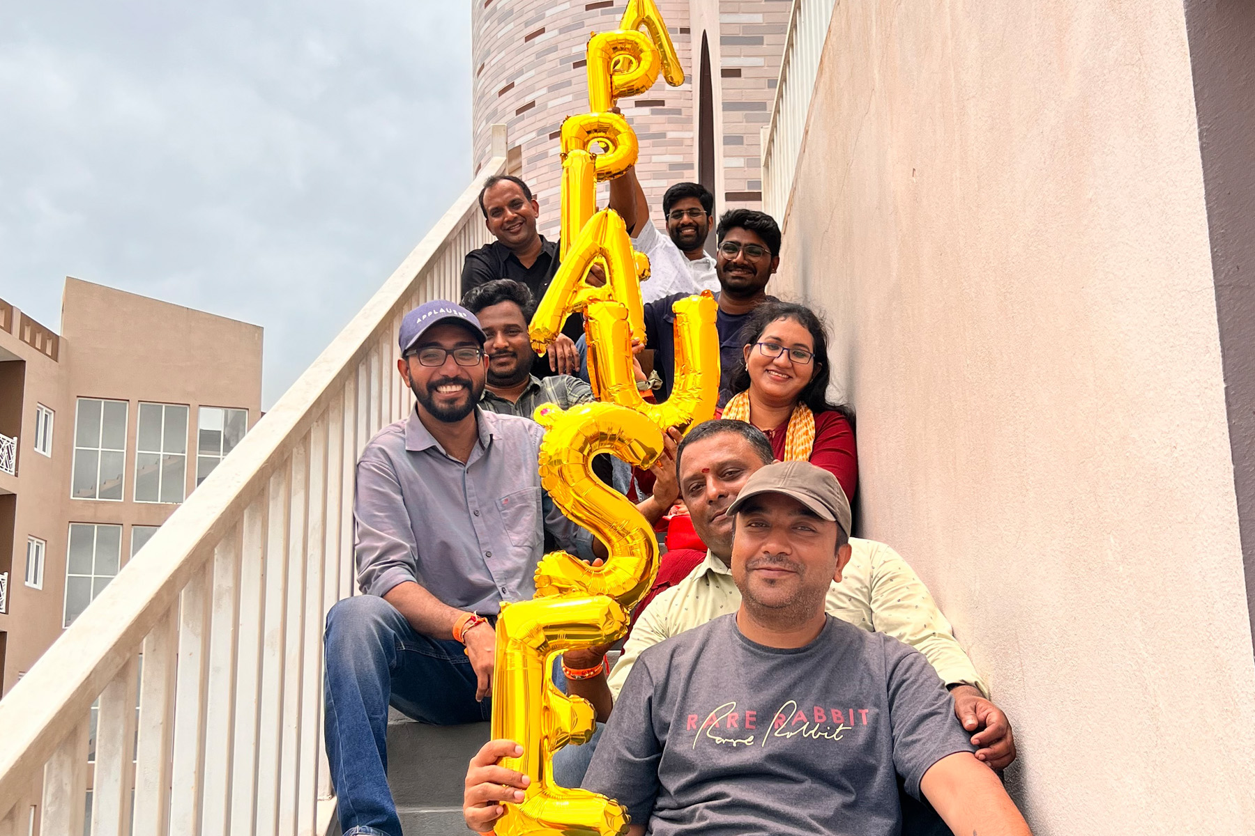 India office with APPLAUSE balloons